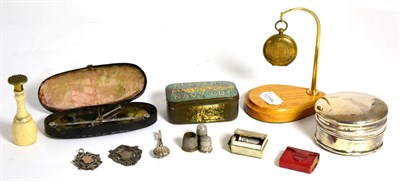 Lot 79 - A silver ring box, thimbles, silver fobs, scales etc