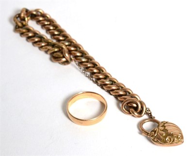 Lot 87 - A 9 carat gold curblink bracelet with heart-shaped locket, both stamped; together with a 9...