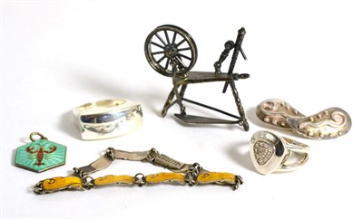 Lot 104 - Miniature silver spinning wheel and five items of silver and enamel jewellery