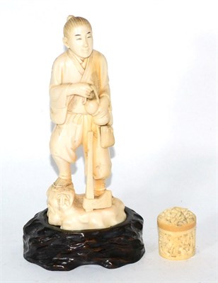 Lot 145 - A Japanese Meiji period ivory okimono with a lidded pot, 19th century (2)