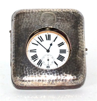 Lot 146 - A travelling timepiece in a silver mounted carrying case