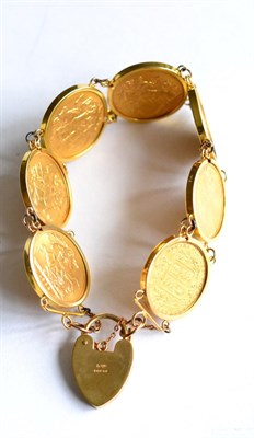 Lot 170 - A bracelet formed of seven framed sovereigns