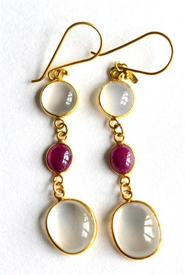 Lot 177 - A pair of moonstone and ruby drop earrings, stamped '585'