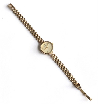 Lot 183 - A lady's 9 carat gold Citizen quartz wristwatch, on a 9 carat gold strap