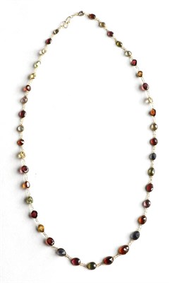 Lot 190 - A multi gemstone graduated necklace, stamped '585'