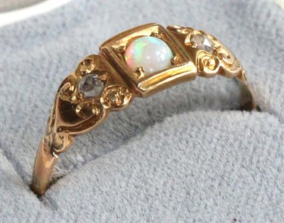 Lot 191 - An opal and diamond ring, stamped '22'