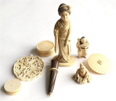 Lot 193 - A Japanese Meij Period ivory okimono; two netsukes of similar date; two early 20th century...