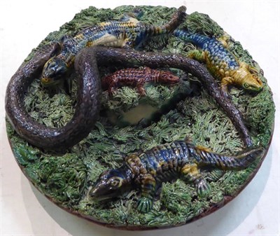 Lot 218 - A Palissy ware plate, decorated with a snake and crocodiles