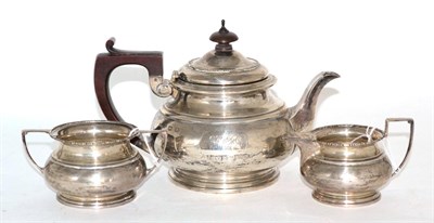 Lot 270 - Silver three piece tea service, inscribed and dated 1925