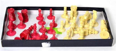 Lot 286 - An early 20th century stained ivory chess set