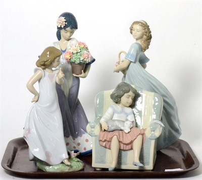 Lot 303 - A group of four Lladro figures