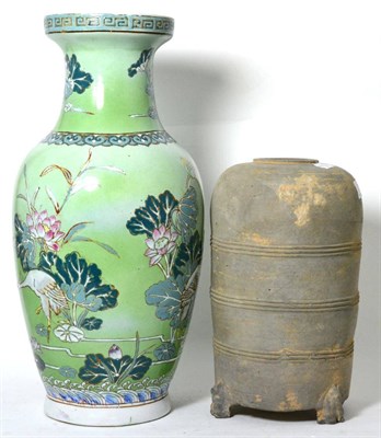 Lot 315 - A reproduction Chinese funerary vase of Song type, together with a modern famille vert vase