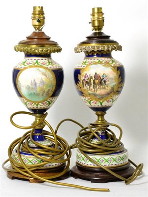 Lot 317 - A pair of gilt metal mounted sevres style lamp bases, early 20th century, decorated with scenes...