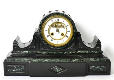 Lot 321 - A late Victorian black slate and marble striking mantel clock