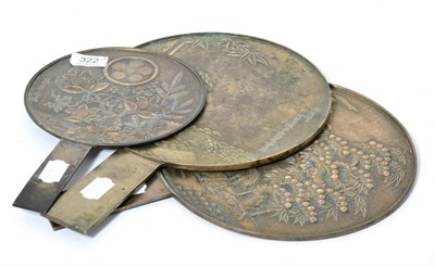 Lot 322 - Three Japanese Meiji Period bronze bound mirrors, each signed