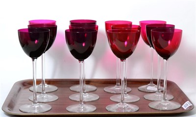 Lot 323 - Set of twelve Baccarat ruby tall stemmed wines