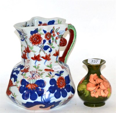 Lot 337 - A small Moorcroft green ground vase, with paper label to base; and a large Reproduction Masons jug