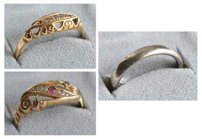 Lot 342 - An 18 carat white gold band ring and two 18 carat gold rings (3)