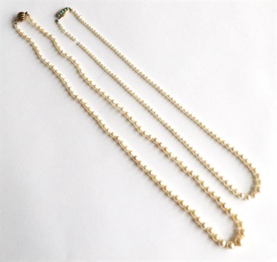 Lot 346 - Two cultured pearl necklaces, one with gold and turquoise clasp, the other with silver gilt snap