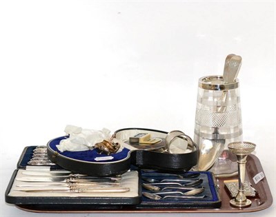 Lot 377 - A group of silver including cased teaspoons and tea knives, cased cruet set, a pair of Georgian...