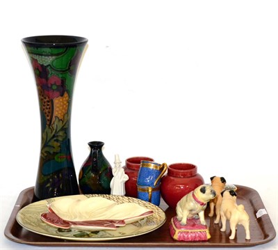 Lot 387 - A Halcyon Days model of a seated pug on cushion, two Beswick pugs, together with other 20th century