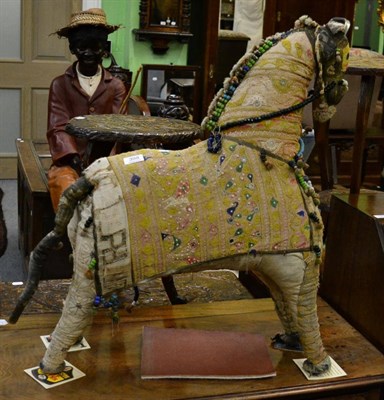 Lot 398 - An Eastern silk and bead work model of a horse