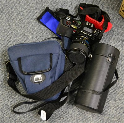 Lot 408 - A Pentax camera and lens