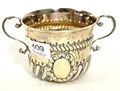 Lot 409 - A Georgian style silver porringer, London