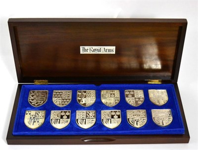 Lot 422 - A set of twelve Elizabeth II silver shield ingots - ";The Royal Arms Collection";, produced by...