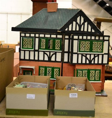 Lot 1004 - 1957 Triang dolls house, with assorted original furniture and accessories (in two shoe boxes)