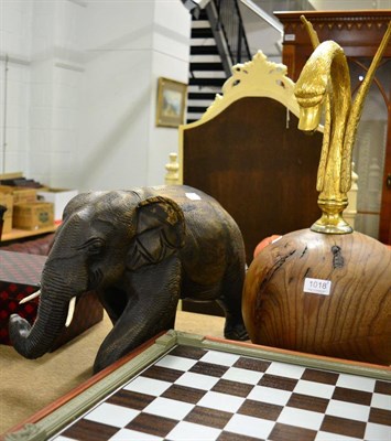 Lot 1018 - A carved wood elephant; turned wood sphere mounted with swan fountain head; and Victorian...