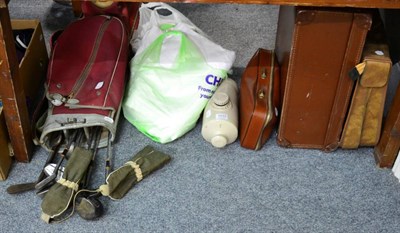 Lot 1033 - Golf clubs, set of petanque balls, white linen, a stoneware hot water bottle and two travelling...