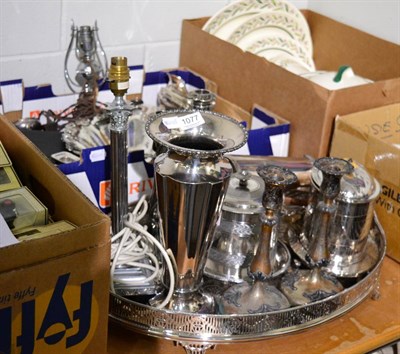 Lot 1077 - A collection of silver plate including a large tray, candlesticks, cutlery, biscuit barrel,...