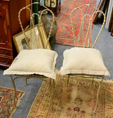 Lot 1163 - A pair of modern painted metal chairs