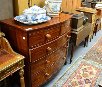 Lot 1169 - A mahogany bow fronted four height chest of drawers and a 19th century oak drop leaf table