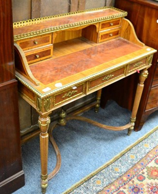 Lot 1170 - A gilt metal mounted kingwood bureau de dame in Louis XVI style