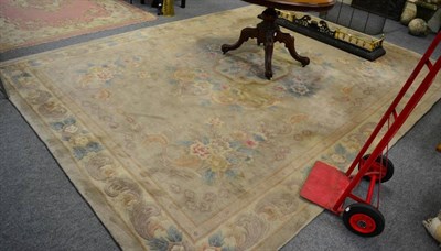 Lot 1197 - Savonnerie design carpet, probably China, the field centred by a stepped medallion framed by floral