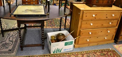 Lot 1212 - A pine chest of drawers and a gate leg drop leaf table