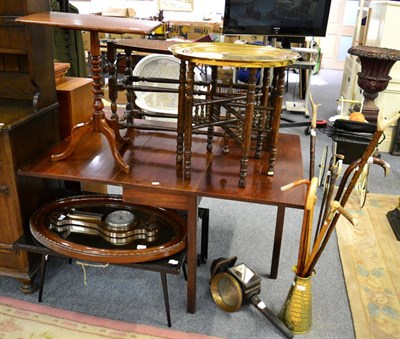 Lot 1216 - A 1950's coffee table, a middle eastern brass topped folding table, a mahogany framed mirror,...