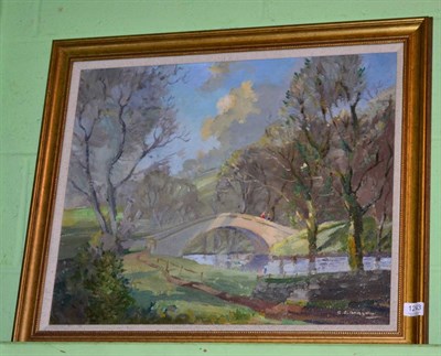 Lot 1243 - C C Barlow, `Packhorse Bridge, Birstwith', signed oil on board