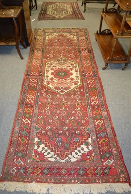 Lot 1318 - Hamadan rug, Iranian Kurdistan, the ivory field of angular vines around a serrated medallion framed