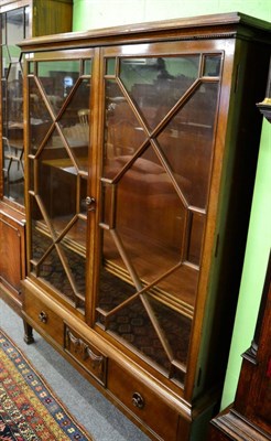 Lot 1322 - A late Edwardian mahogany astragal glazed display cabinet