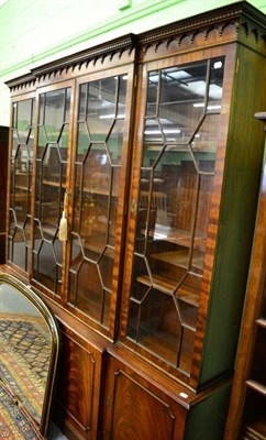 Lot 1323 - A Bevan & Funnell mahogany breakfront bookcase