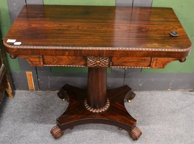 Lot 1327 - A Regency rosewood fold over card table