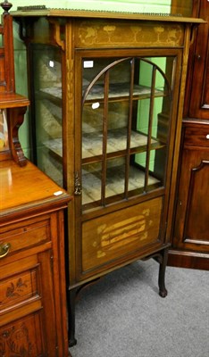 Lot 1335 - An Edwardian inlaid mahogany display cabinet