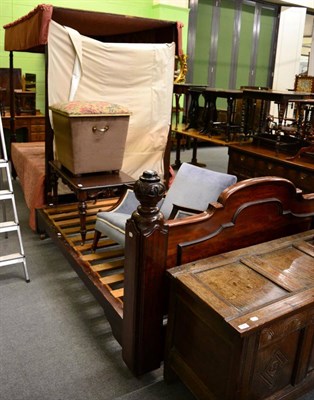 Lot 1342 - A carved mahogany bedstead