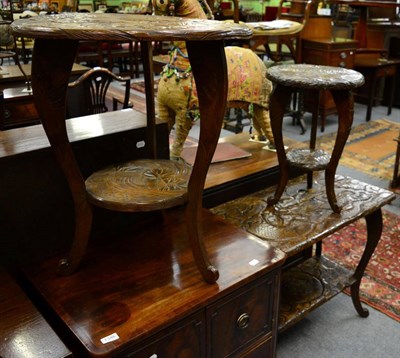 Lot 1345 - A Chinese carved side table with a dragon carved top, and two other carved floral decorated...