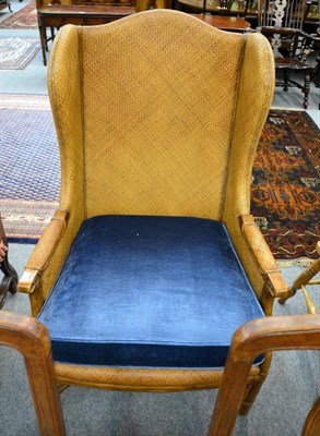 Lot 1380 - A close weave bamboo wing back chair