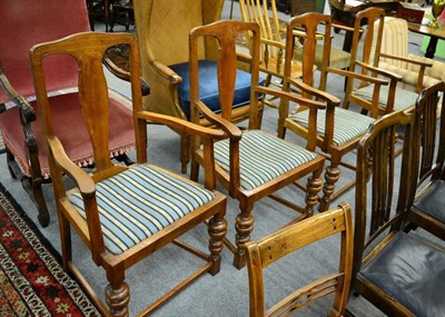 Lot 1382 - Set of four walnut armchairs