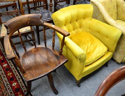 Lot 1386 - A Victorian buttoned back armchair and an elm swivelling smokers chair